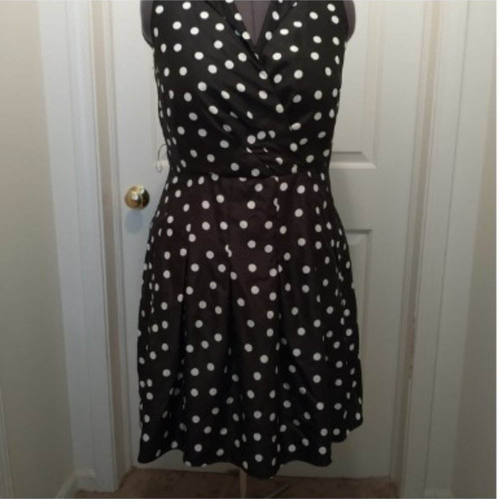 Polka dot dress, faux wrap, polyester with self belt/sash, thread belt loops.